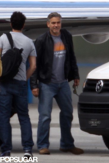 George Clooney boarded a plane in Switzerland.
George Clooney boarded a plane in Switzerland.