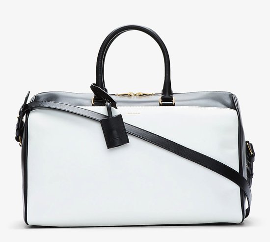 We can't think of more polished way to carry your clothes than in this Saint Laurent black-and-white leather duffel bag ($2,650).
We can't think of more polished way to carry your clothes than in this Saint Laurent black-and-white leather duffel bag ($2,650).