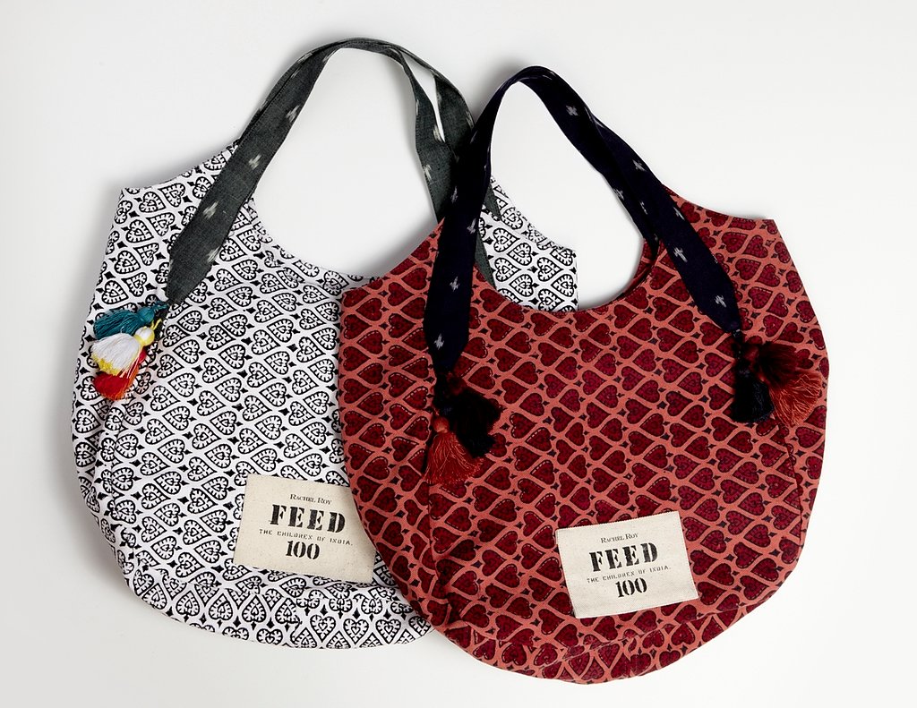 Rachel Roy and FEED Projects founder Lauren Bush Lauren created the FEED 100 India bag ($78) in two different colorways. For every bag sold, 100 school meals will be provided to children in India. What more could you want? It's a great Summer tote with an even better message behind it.
Rachel Roy and FEED Projects founder Lauren Bush Lauren created the FEED 100 India bag ($78) in two different colorways. For every bag sold, 100 school meals will be provided to children in India. What more could you want? It's a great Summer tote with an even better message behind it.