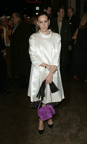 For a 2009 Broadway outing, Parker kept it classic in a polka-dot dress, satin overcoat, and long leather gloves, then injected a pop of flair via a purple suede bag.
For a 2009 Broadway outing, Parker kept it classic in a polka-dot dress, satin overcoat, and long leather gloves, then injected a pop of flair via a purple suede bag.