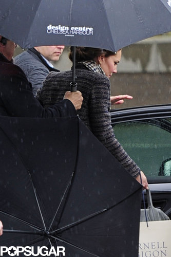 Kate Middleton Keeps It Comfortable in Sneakers During a Rainy Shopping Trip Kate Middleton Keeps It Comfortable in Sneakers During a Rainy Shopping Trip