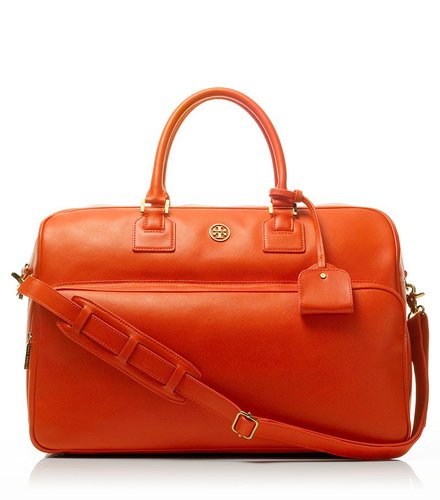 Gently suggest a recent grad tosses the threadbare backpack — she's certain to feel like a true-blue grown-up when packing for a weekend getaway in Tory Burch's smart duffel ($850).
Gently suggest a recent grad tosses the threadbare backpack — she's certain to feel like a true-blue grown-up when packing for a weekend getaway in Tory Burch's smart duffel ($850).