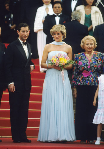 Princess Diana chose a simple blue chiffon dress by Catherine Walker for the festival in 1987. It was reportedly meant as an homage to a gown Princess Grace of Monaco wore in Alfred Hitchcock's To Catch a Thief.
Princess Diana chose a simple blue chiffon dress by Catherine Walker for the festival in 1987. It was reportedly meant as an homage to a gown Princess Grace of Monaco wore in Alfred Hitchcock's To Catch a Thief.