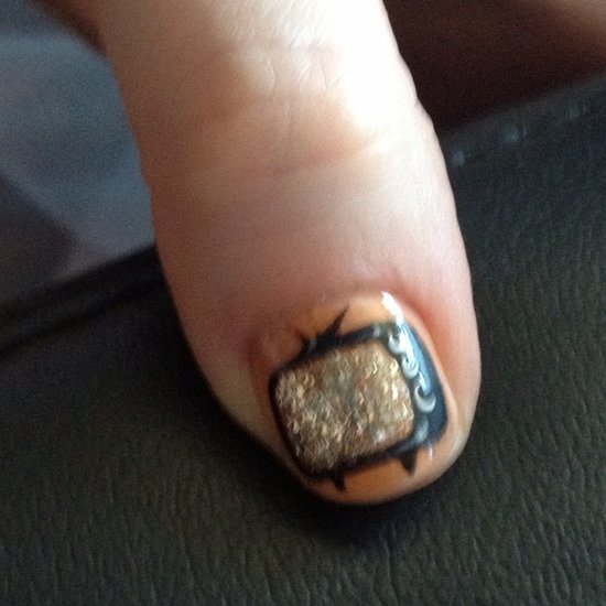 For the 2012 Emmys, Zooey Deschanel wore glittering television sets on her thumbs and sparkling jewels on her other fingers. The complex nail design was created by celebrity manicurist Tom Bachik.
Source: Instagram user ZooeyDeschanel
For the 2012 Emmys, Zooey Deschanel wore glittering television sets on her thumbs and sparkling jewels on her other fingers. The complex nail design was created by celebrity manicurist Tom Bachik.
Source: Instagram user ZooeyDeschanel