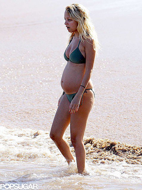Nicole Richie flaunted her bikini body in Hawaii while pregnant with Harlow in 2007.
Nicole Richie flaunted her bikini body in Hawaii while pregnant with Harlow in 2007.