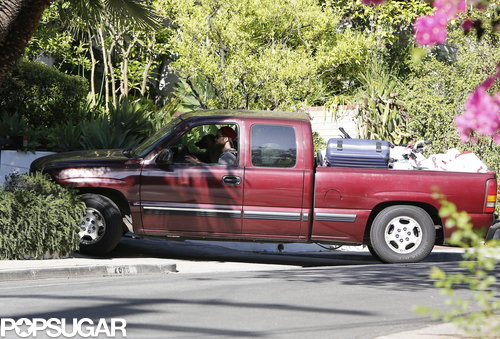 Robert Pattinson pulled up to a driveway.
Robert Pattinson pulled up to a driveway.