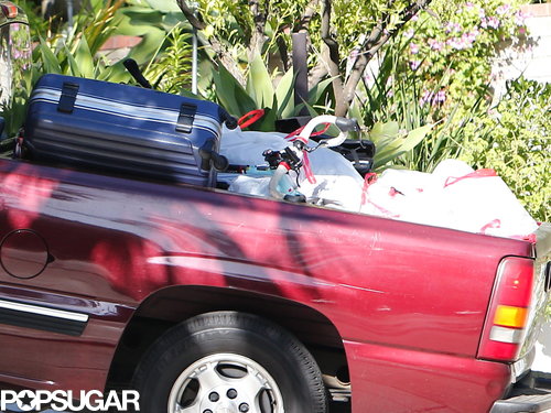 Robert Pattinson had a suitcase and several trash bags in his truck.
Robert Pattinson had a suitcase and several trash bags in his truck.