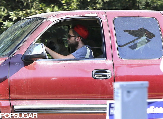 Robert Pattinson drove out of Kristen Stewart's gated community.
Robert Pattinson drove out of Kristen Stewart's gated community.