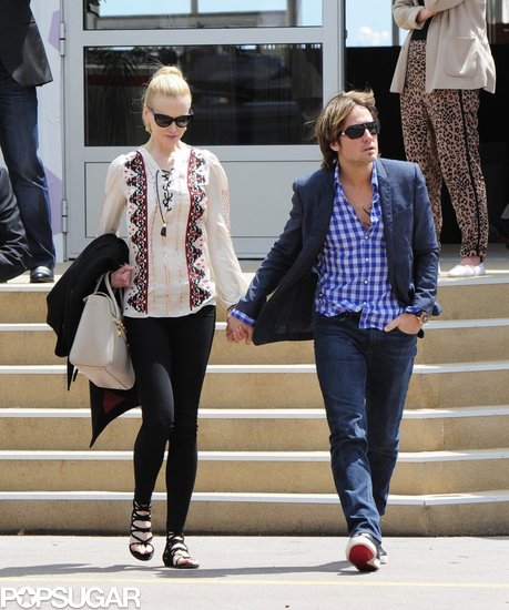 Nicole Kidman showed off a breezy printed lace-up Altuzarra blouse and black strappy Jimmy Choo sandals on her way to grab lunch with Keith Urban in Cannes.
Nicole Kidman showed off a breezy printed lace-up Altuzarra blouse and black strappy Jimmy Choo sandals on her way to grab lunch with Keith Urban in Cannes.