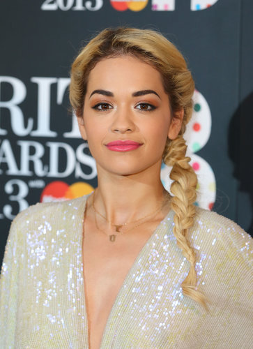 A twisted ponytail, like Rita Ora's at the Brit Awards, adds a fun twist to the classic style.
A twisted ponytail, like Rita Ora's at the Brit Awards, adds a fun twist to the classic style.