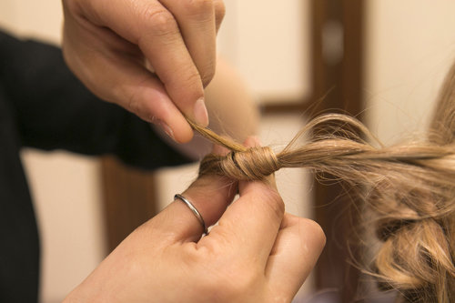 To hide the elastic at the end, wrap the hair around and tuck into the elastic. This will help make the finished look more seamless.
To hide the elastic at the end, wrap the hair around and tuck into the elastic. This will help make the finished look more seamless.