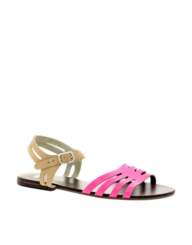 The hot-pink straps on this ASOS buckler ($31) get tempered with nude.
The hot-pink straps on this ASOS buckler ($31) get tempered with nude.