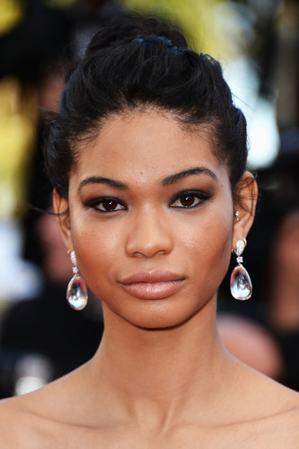 Chanel Iman accessorized with a dramatic pair of jeweled drop earrings.
Chanel Iman accessorized with a dramatic pair of jeweled drop earrings.