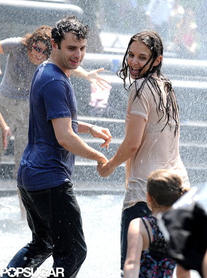 Katie Holmes and Luke Kirby jumped in an NYC fountain while filming Mania Days.
Katie Holmes and Luke Kirby jumped in an NYC fountain while filming Mania Days.