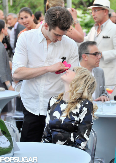 Emma Stone and Andrew Garfield played around during the benefit.
Emma Stone and Andrew Garfield played around during the benefit.