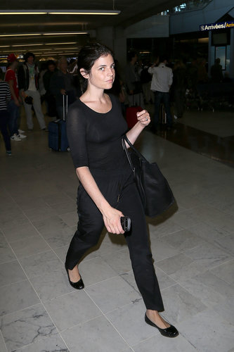 Just when you're about to slip into your sweats and board the plane, remember how good Julia Restoin Roitfeld looked in all black at a French airport, and swap the loungewear for a chic black tee and trousers.
Just when you're about to slip into your sweats and board the plane, remember how good Julia Restoin Roitfeld looked in all black at a French airport, and swap the loungewear for a chic black tee and trousers.