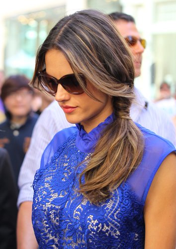 A side ponytail doesn't have to skew childish. Alessandra Ambrosio's twisted effect and loose tendrils made the look more age appropriate.
A side ponytail doesn't have to skew childish. Alessandra Ambrosio's twisted effect and loose tendrils made the look more age appropriate.