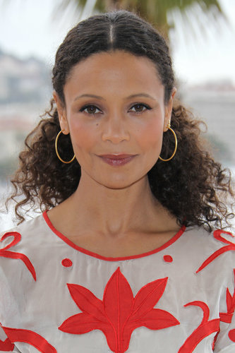 Women with curly hair sometimes have too much hair to fit in one rubberband. Take a note from Thandie Newton's style book and use bobby pins to secure hair behind the ears in a faux ponytail.
Women with curly hair sometimes have too much hair to fit in one rubberband. Take a note from Thandie Newton's style book and use bobby pins to secure hair behind the ears in a faux ponytail.