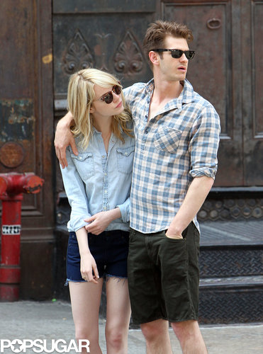 Andrew Garfield put his arm around Emma Stone.
Andrew Garfield put his arm around Emma Stone.