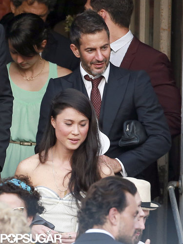 Marc Jacobs admired the bride with a group of guests.
Marc Jacobs admired the bride with a group of guests.