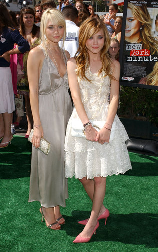 Twinning combo: For the Hollywood premiere of New York Minute, Mary-Kate and Ashley channeled the roaring 20s in ladylike looks accessorized with strands of pearls.
Ashley chose a gray pleated halter with metallic sandals and a glistening clutch.
Mary-Kate paired a tiered lace dress with pink pointed pumps and a white leather clutch.
Twinning combo: For the Hollywood premiere of New York Minute, Mary-Kate and Ashley channeled the roaring 20s in ladylike looks accessorized with strands of pearls.
Ashley chose a gray pleated halter with metallic sandals and a glistening clutch.
Mary-Kate paired a tiered lace dress with pink pointed pumps and a white leather clutch.
