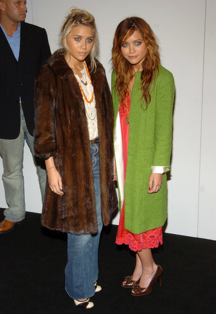 Twinning combo: During Spring 2005 New York Fashion Week, the Olsens proved the power of statement outerwear, bundling up in two noteworthy coats.
Mary-Kate played the color card, layering an apple-green coat over her punchy slip dress.
Ashley warmed up in a luxe, chocolate-colored fur and light-wash denim.
Twinning combo: During Spring 2005 New York Fashion Week, the Olsens proved the power of statement outerwear, bundling up in two noteworthy coats.
Mary-Kate played the color card, layering an apple-green coat over her punchy slip dress.
Ashley warmed up in a luxe, chocolate-colored fur and light-wash denim.