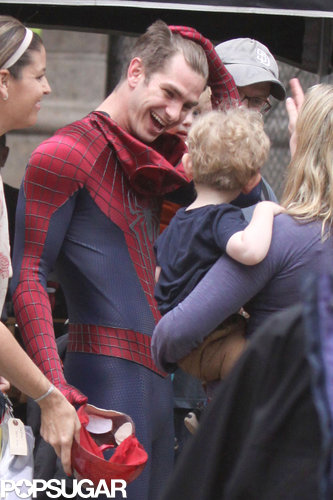 In NYC, Andrew Garfield gave a small fan a big smile on set.
In NYC, Andrew Garfield gave a small fan a big smile on set.