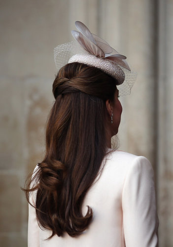 Kate Middleton took care to match her nude embellished hat to her dress.
Kate Middleton took care to match her nude embellished hat to her dress.