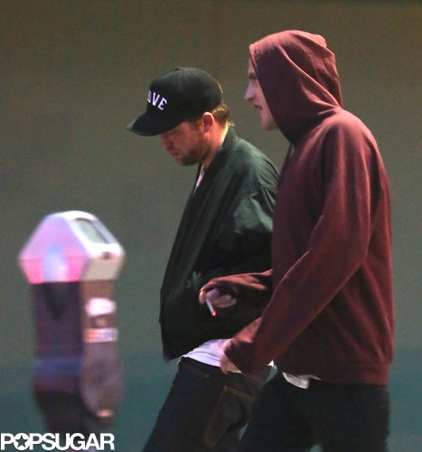 Robert Pattinson left the concert with a friend.
Robert Pattinson left the concert with a friend.