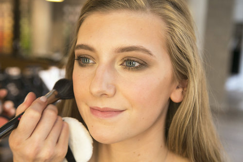 Even though your cheeks are already contoured with bronzer, make sure to give them a hint of flushed color by applying blush to the apples of your cheeks.
Even though your cheeks are already contoured with bronzer, make sure to give them a hint of flushed color by applying blush to the apples of your cheeks.