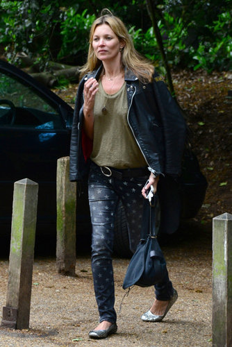 Kate Moss got trendy in a pair of star-print denim and a black leather jacket in London.
Kate Moss got trendy in a pair of star-print denim and a black leather jacket in London.