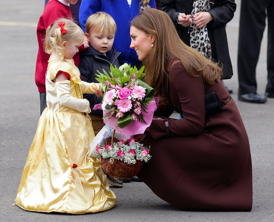 Kate Middleton chatted with a girl in a princess costume on March 5 when she toured the town of Grimsby in England.
Kate Middleton chatted with a girl in a princess costume on March 5 when she toured the town of Grimsby in England.