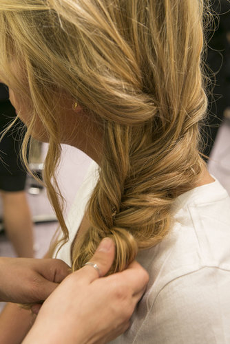 Before you secure with an elastic, muss up the braid a little with your fingers to get a slightly imperfect look.
Before you secure with an elastic, muss up the braid a little with your fingers to get a slightly imperfect look.