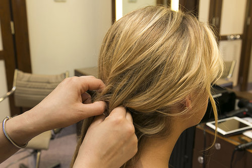 Next, the advanced DIY braider can create a loose french braid starting behind the opposing ear to help hold the sideswept hair in place. For beginners, try a regular braid or just twist hair over to help keep it in place.
Next, the advanced DIY braider can create a loose french braid starting behind the opposing ear to help hold the sideswept hair in place. For beginners, try a regular braid or just twist hair over to help keep it in place.