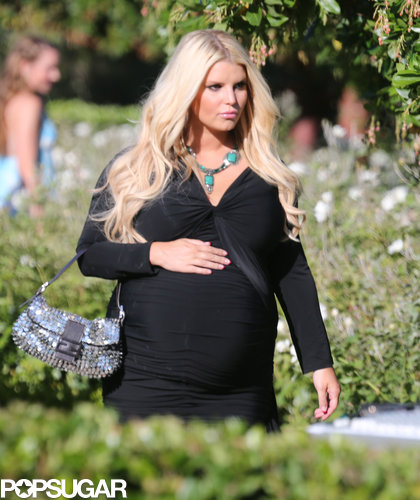 Jessica Simpson covered her baby bump in a black gown.
Jessica Simpson covered her baby bump in a black gown.