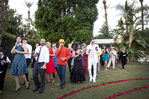 Play Dress Up
Whether it's costumes at a Halloween wedding or just hats and props for the reception, guests love an excuse to dress up. This wedding had a Beatles theme: "Sgt. Pepper Pool Party."
Photo by Ashleigh Taylor Photography via Green Wedding Shoes
Play Dress Up
Whether it's costumes at a Halloween wedding or just hats and props for the reception, guests love an excuse to dress up. This wedding had a Beatles theme: "Sgt. Pepper Pool Party."
Photo by Ashleigh Taylor Photography via Green Wedding Shoes