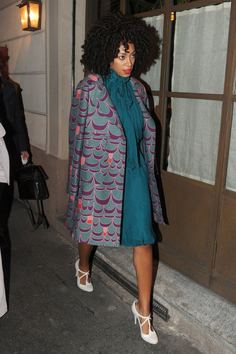 During Milan Fashion Week Fall 2012, Solange Knowles topped her teal neck-tie dress with a purple printed coat and white-hot t-strap perforated pumps.
During Milan Fashion Week Fall 2012, Solange Knowles topped her teal neck-tie dress with a purple printed coat and white-hot t-strap perforated pumps.