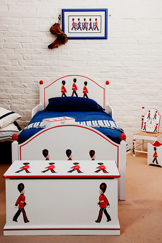 Dragons of Walton Street, the tot hand-painted furniture store in London that designed Prince William's nursery, has their own London-themed pattern — Terry's Soldiers — that can adorn anything from toy chests and wastebaskets to beds, chairs, and bookshelves.
Dragons of Walton Street, the tot hand-painted furniture store in London that designed Prince William's nursery, has their own London-themed pattern — Terry's Soldiers — that can adorn anything from toy chests and wastebaskets to beds, chairs, and bookshelves.