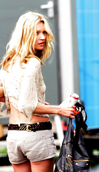 Do like Kate and deal with hot weather by wearing as little as possible. In this instance, her tiny gray shorts were topped with a navel-skimming shirt. And if your bag gets a little muddy? Don't stress out about it!
Do like Kate and deal with hot weather by wearing as little as possible. In this instance, her tiny gray shorts were topped with a navel-skimming shirt. And if your bag gets a little muddy? Don't stress out about it!