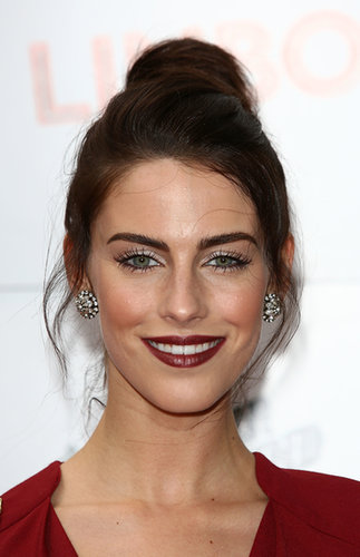 To add softness to your topknot, just add face-framing tendrils, like Jessica Lowndes shows here.
To add softness to your topknot, just add face-framing tendrils, like Jessica Lowndes shows here.