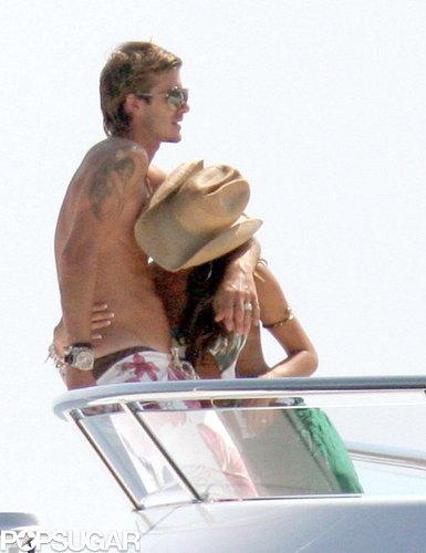David Beckham and Victoria Beckham cuddled up on a yacht together in June 2005 while in Saint-Tropez.
David Beckham and Victoria Beckham cuddled up on a yacht together in June 2005 while in Saint-Tropez.