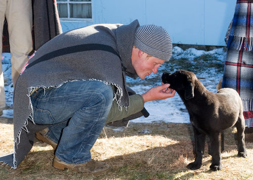 Prince Harry nuzzled up to a puppy during a visit to Africa in June 2010.
Prince Harry nuzzled up to a puppy during a visit to Africa in June 2010.
