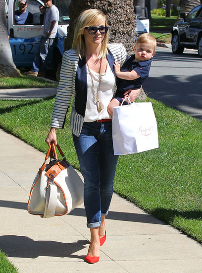 Just like Reese Witherspoon did while on mommy duty in LA recently, pair a striped blazer with your favorite denim, then amp things up with a pair of red pumps. Then jazz things up even more with statement sunglasses and a gold necklace.
Just like Reese Witherspoon did while on mommy duty in LA recently, pair a striped blazer with your favorite denim, then amp things up with a pair of red pumps. Then jazz things up even more with statement sunglasses and a gold necklace.