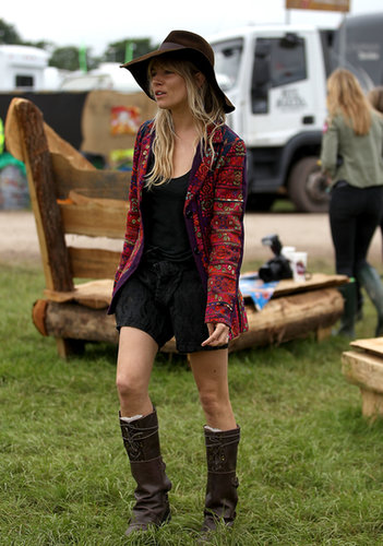 We can't help but imagine dressing for Glastonbury is a no-brainer for Sienna Miller, whose personal style manifests itself here in a floppy hat, slouchy boots, and bohemian topper.
We can't help but imagine dressing for Glastonbury is a no-brainer for Sienna Miller, whose personal style manifests itself here in a floppy hat, slouchy boots, and bohemian topper.