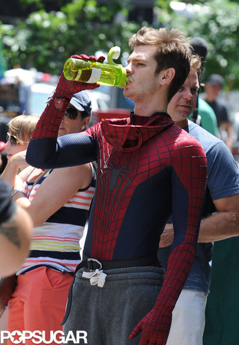 Andrew Garfield hydrated between filming in his Spider-Man suit in NYC.
Andrew Garfield hydrated between filming in his Spider-Man suit in NYC.