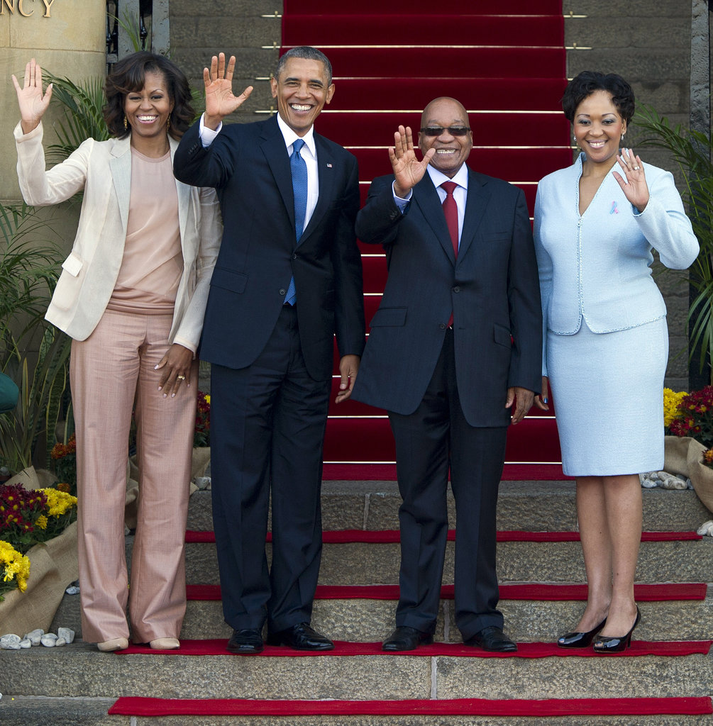 The first lady tried out a more relaxed silhouette as she and President Obama stood alongside South African President Jacob Zuma and his wife Thobeka Madiba-Zuma.
The first lady tried out a more relaxed silhouette as she and President Obama stood alongside South African President Jacob Zuma and his wife Thobeka Madiba-Zuma.