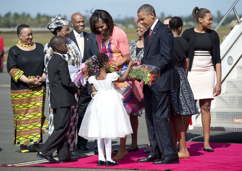 Children greeted President Obama and First Lady Michelle with flowers when they arrived in Dar Es Salaam, Tanzania, in July.
Children greeted President Obama and First Lady Michelle with flowers when they arrived in Dar Es Salaam, Tanzania, in July.