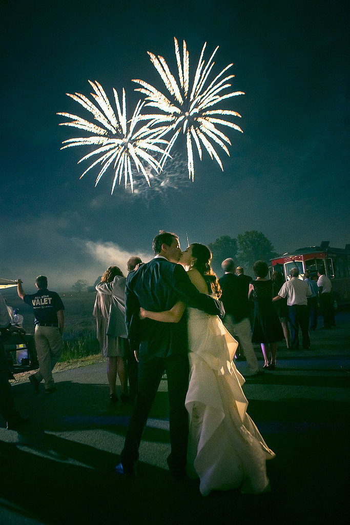 The happy pair smooched under the fireworks.
Photo by Heather Waraksa via Style Me Pretty
The happy pair smooched under the fireworks.
Photo by Heather Waraksa via Style Me Pretty