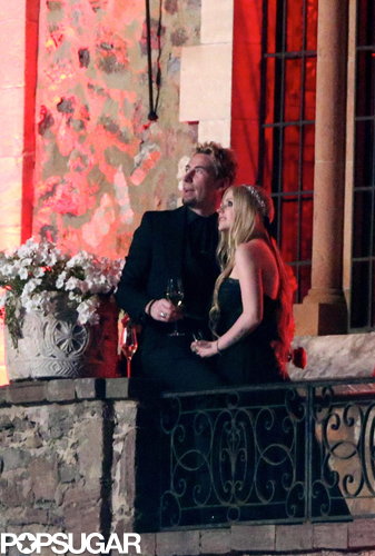 Avril Lavigne and Chad Kroeger toasted on the balcony.
Avril Lavigne and Chad Kroeger toasted on the balcony.