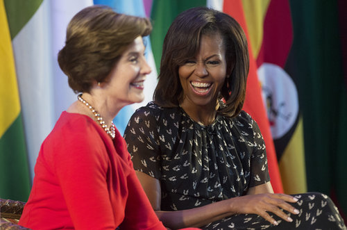 First Lady Michelle Obama laughed alongside former First Lady Laura Bush at the African First Ladies Summit in Dar es Salaam, Tanzania, in July.
First Lady Michelle Obama laughed alongside former First Lady Laura Bush at the African First Ladies Summit in Dar es Salaam, Tanzania, in July.